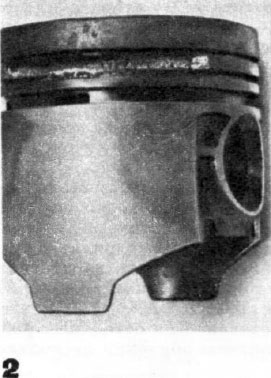 Рис. 2. Разрушение перегородок между поршневыми кольцами — результат детонации, возникшей при работе двигателя ВАЗ —2103 на бензине А-76.