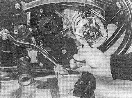 Рис.34. Демонтаж кожуха цепи
